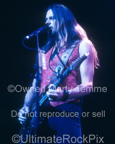 Photo of Reb Beach of Whitesnake in concert by Marty Temme