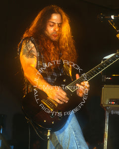 Photo of guitarist Al Pitrelli in concert in 1994 by Marty Temme