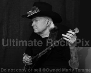 Black and white photo of Texas blues legend Johnny Winter during a photo shoot in 2013 by Marty Temme