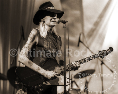 Art Print of Johnny Winter playing his Gibson Firebird in concert in 1998 by Marty Temme
