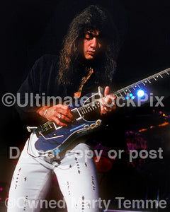 Photo of guitar player Vito Bratta of White Lion in concert in 1989 by Marty Temme