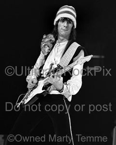 Photos of Guitarist Ron Wood of The Rolling Stones and Faces Playing a Fender Stratocaster in Concert in 1973 by Marty Temme