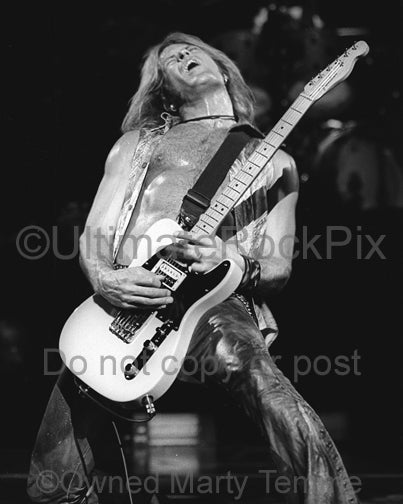 Black and white photo of Doug Aldrich playing a Fender Telecaster - wsdabw031