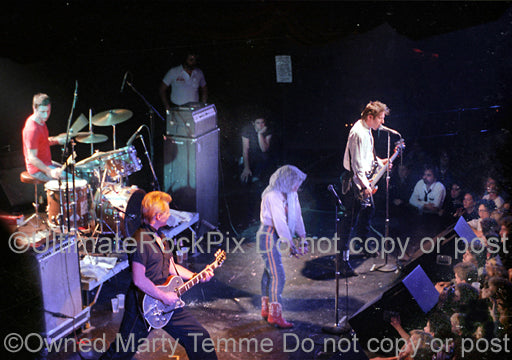 Photo of the punk rock band X in concert in 1981 by Marty Temme