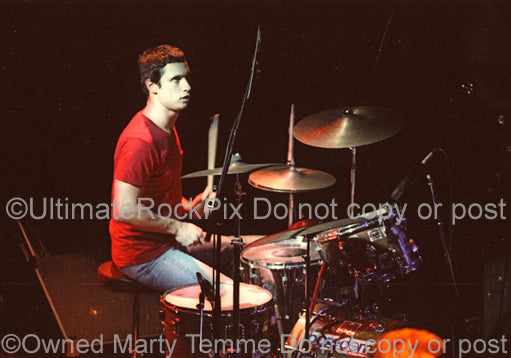 Photo of D. J. Bonebrake of the band X in concert in 1981 by Marty Temme