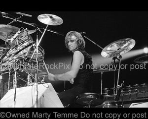 Photo of drummer Alan White of the band Yes in concert in 1978 by Marty Temme