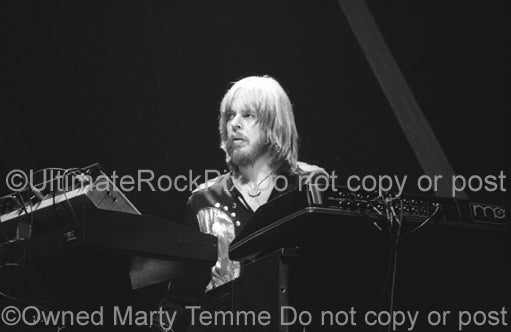 Photo of keyboardist Rick Wakeman of Yes in concert in the 1970's