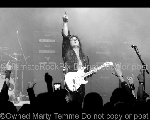 Black and white photo of Yngwie Malmsteen onstage in 2008 by Marty Temme