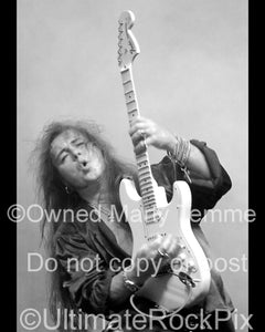 Black and white photo of guitarist Yngwie Malmsteen in concert by Marty Temme