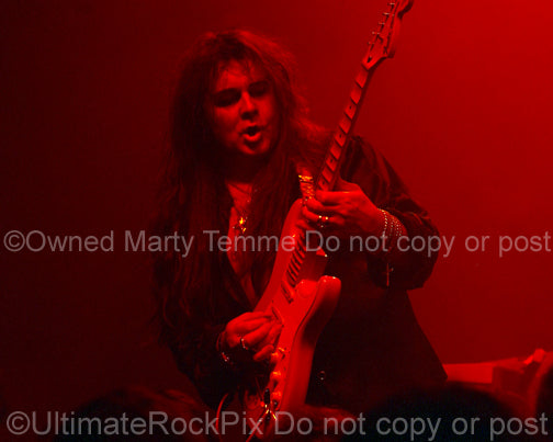 Photo of Yngwie Malmsteen in concert by Marty Temme