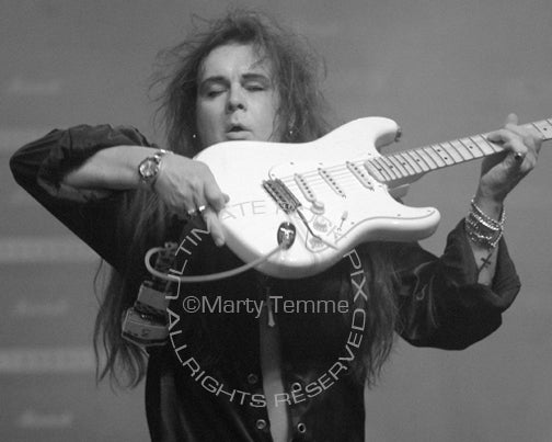 Black and white photo of Yngwie Malmsteen onstage by Marty Temme
