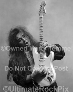 Black and white photo of guitarist Yngwie Malmsteen in concert in 2008 by Marty Temme
