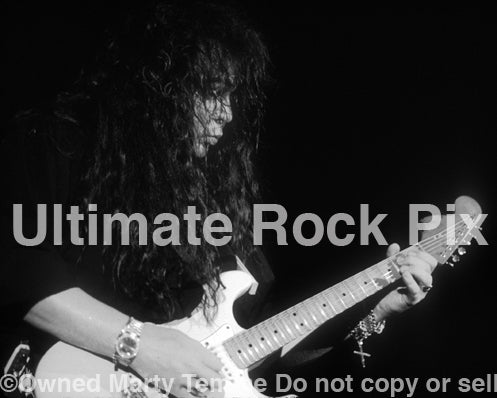 Black and white photo of Yngwie Malmsteen in concert in 1994 by Marty Temme