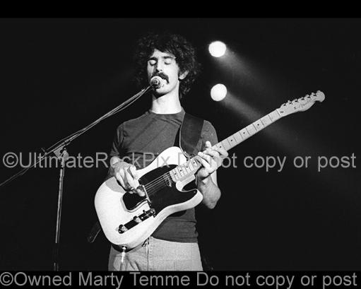 Photos of Guitarist Frank Zappa Playing a Fender Telecaster in 1973 by Marty Temme