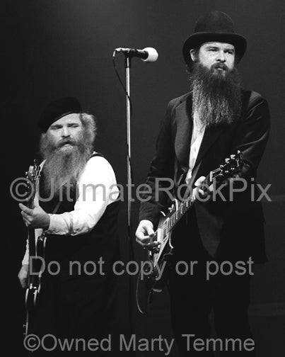 Photo of Billy Gibbons and Dusty Hill of ZZ Top in concert in 1979 by Marty Temme