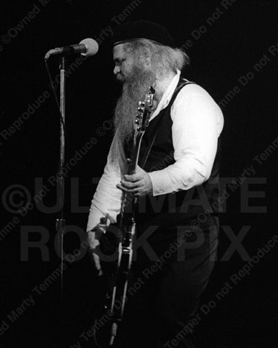Photo of Dusty Hill of ZZ Top in concert in 1979 by Marty Temme